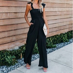 Vici Ruffle Smocked Pocketed Jumpsuit